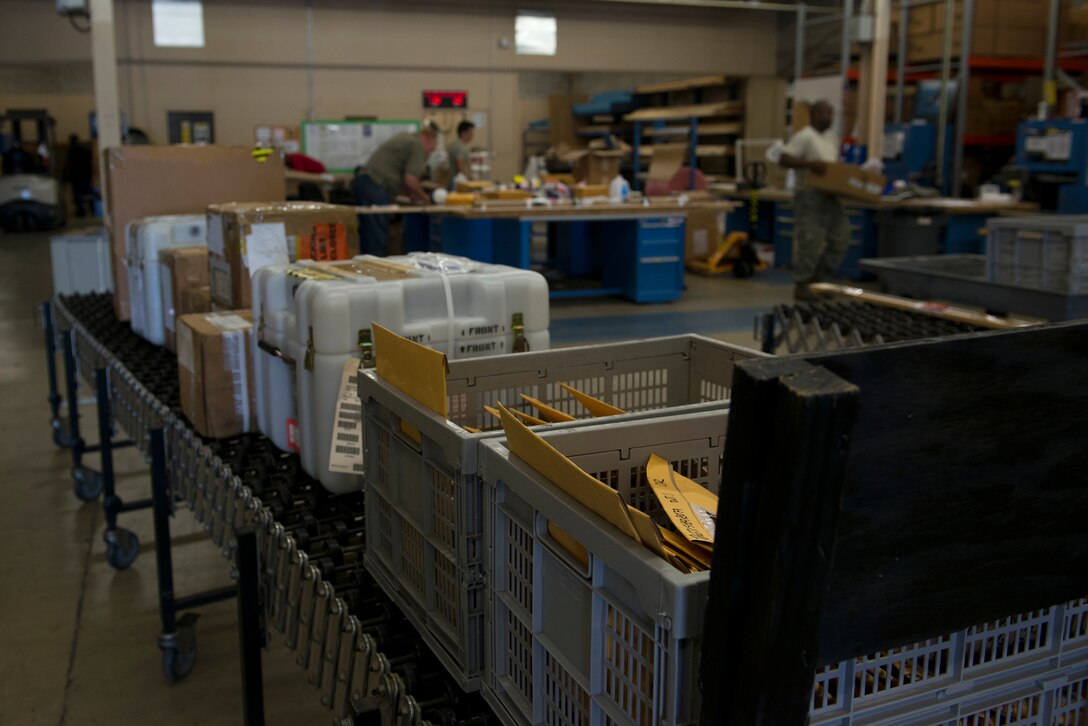 Packages being processed by the traffic management office rest in the packaging and crating section of the cargo-movement warehouse July 9, 2015, at Moody Air Force, Ga. The warehouse stays organized using three sections to track packages: inbound, outbound and packing and crating. (U.S. Air Force photo by Airman 1st Class Kathleen D. Bryant/Released)
