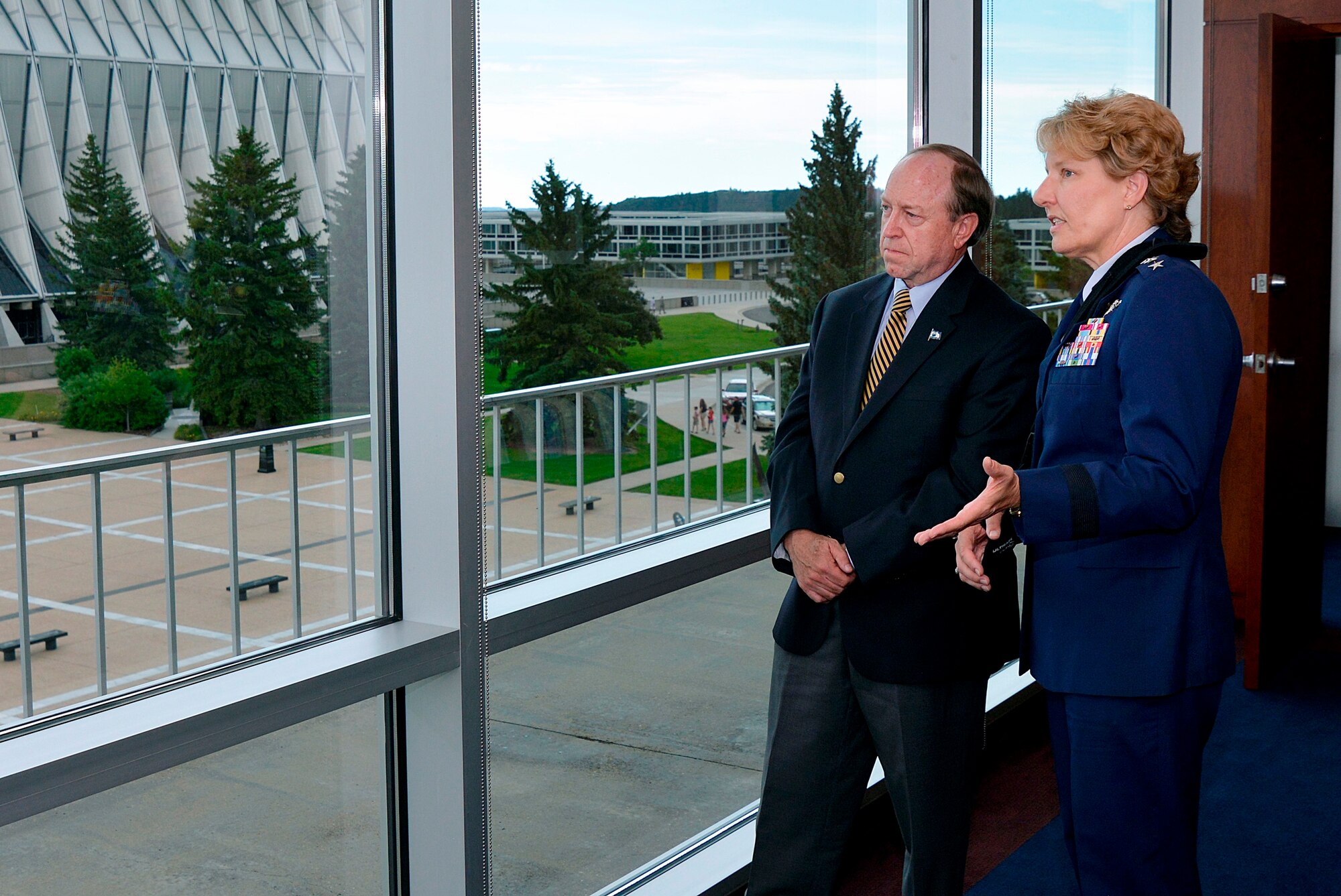 Lt. Gen. Michelle D. Johnson, the Air Force Academy superintendent, and John Suthers, the mayor of Colorado Springs, look across the terrazzo from inside Johnson's office July 13, 2015. Johnson and Suthers met in person for the first time at the Academy to discuss the longstanding relationship between the Academy and the City of Colorado Springs. (U.S. Air Force photo/Jason Gutierrez)