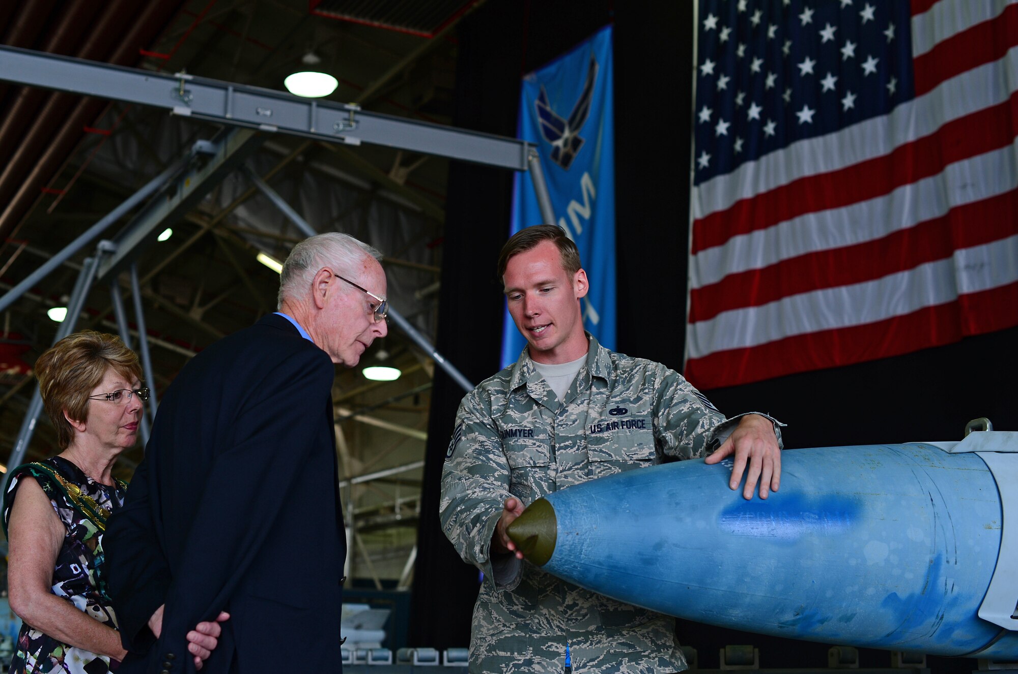 Staff Sgt. Ronald Dunmyer, 48th Munitions Squadron conventional maintenance crew member, interacts with local British dignitaries during an Honorary Commanders summer reception at Royal Air Force Lakenheath, England, July 10, 2015. The reception allowed local dignitaries and British leaders the chance to visit the base to encourage continual partnership between local key leaders and military communities. (U.S. Air Force photo by Senior Airman Erin O’Shea/Released)