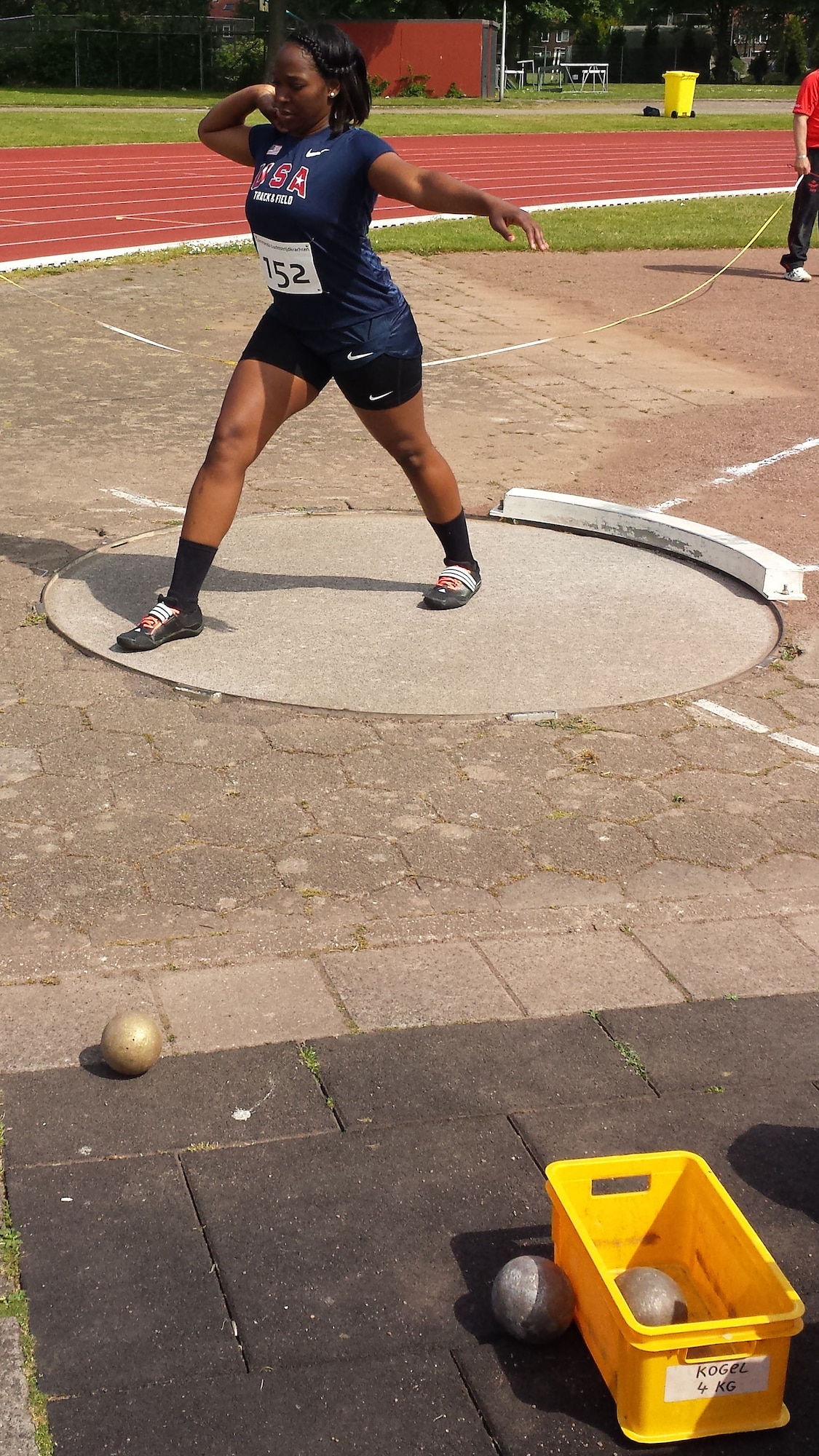 Airman 1st Class Jessica Johnson, a 4th Aerospace Medicine Squadron public health technician, prepares to throw a shot put May 27, 2015, at the 2015 Headquarters Aircom Inter-Nation Athletics Championship in Amsterdam. Johnson threw the shot 11.44 meters, finishing the competition in second place, and contributing to the U.S. Air Forces in Europe – Air Forces Africa women's team taking home the gold medal. (Courtesy photo)