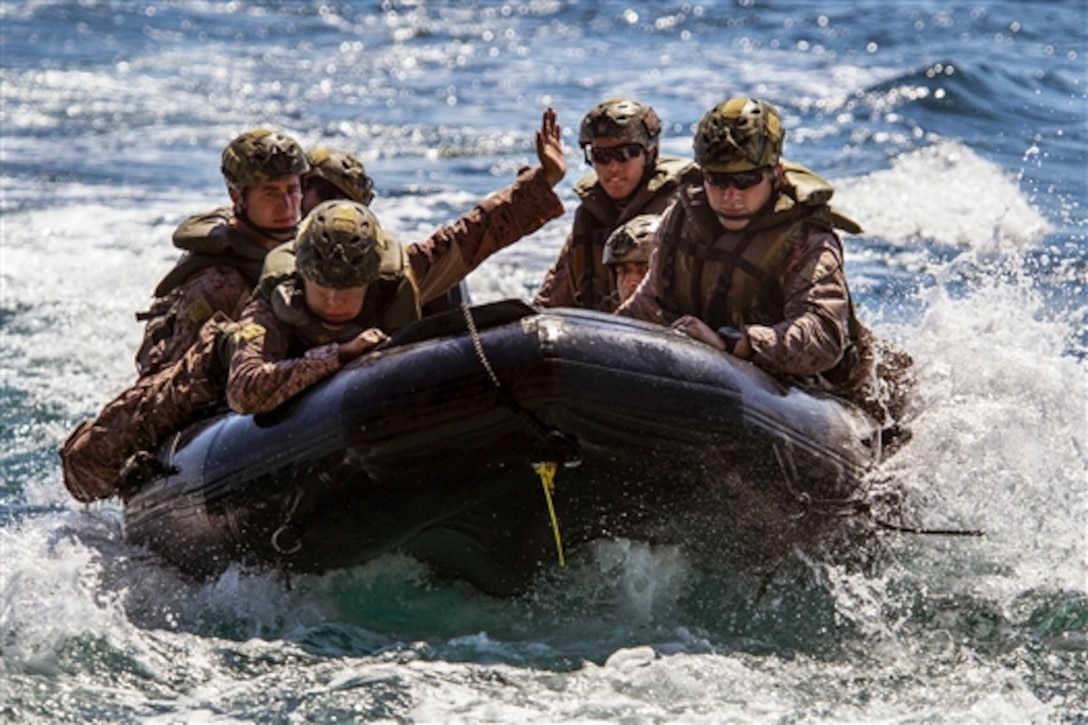 U.S. Marines use combat rubber raiding craft from the amphibious transport dock ship USS Green Bay during Talisman Sabre 2015 in the Indian Ocean, July 12, 2015. The biennial exercise provides an opportunity for nearly 30,000 U.S. and Australian forces to increase ability to plan and execute a full range of operations.