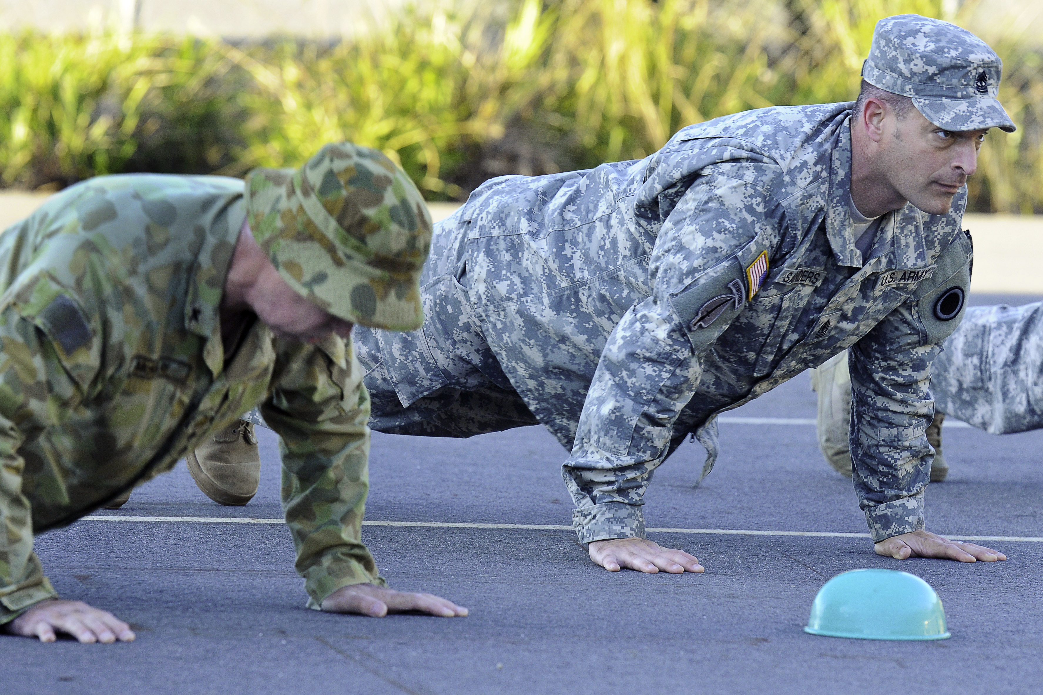 U S Army 1st Sgt Daniel Saunders Right Does Push ups With An 