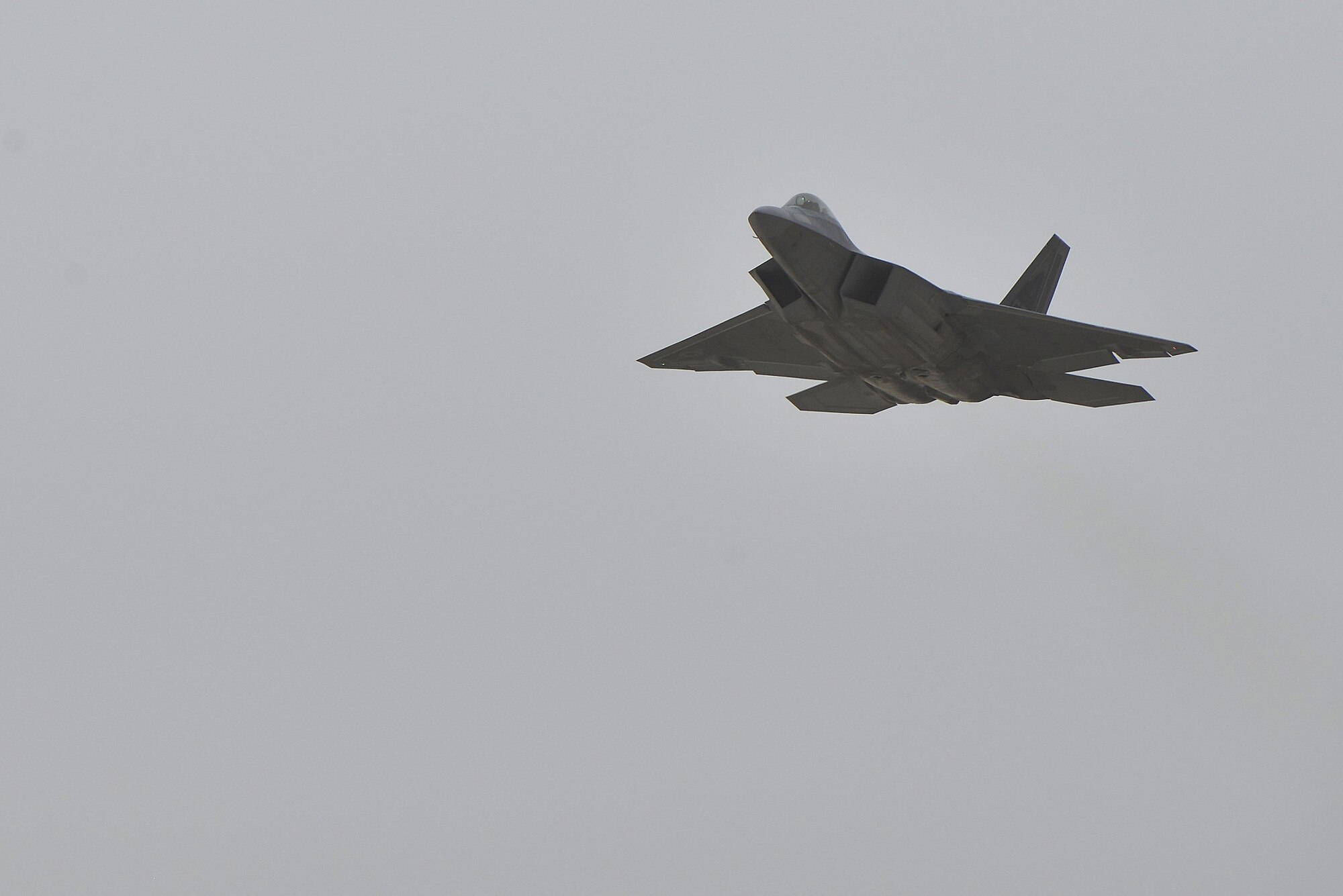 An F-22 Raptor takes off from the runway during a combat sortie at an undisclosed location in Southwest Asia July 9, 2015. The F-22, a critical component of the Global Strike Task Force, is designed to project air dominance, rapidly and at great distances and defeat threats attempting to deny access to our nation's military forces. (U.S. Air Force photo/Tech. Sgt. Christopher Boitz)