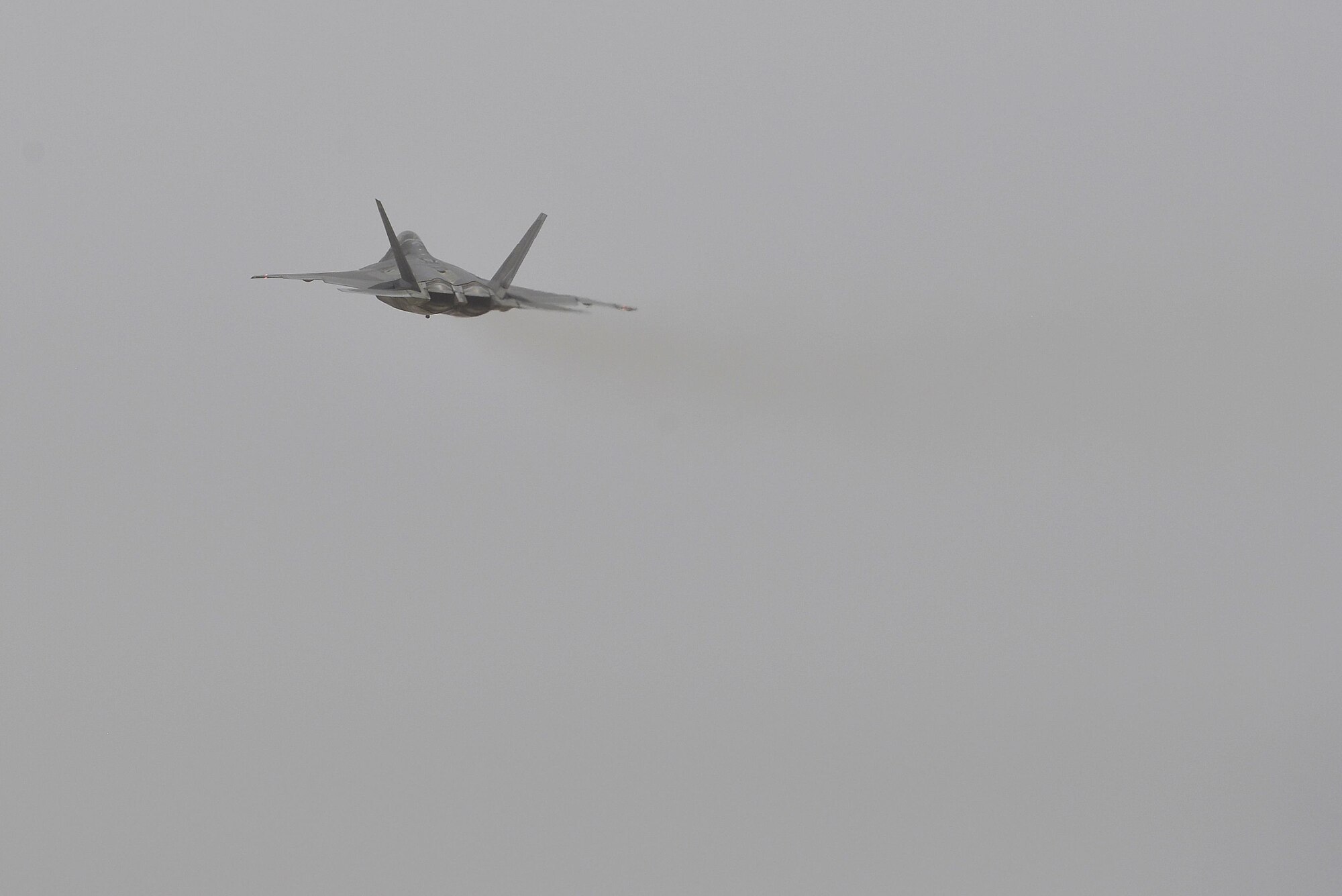 An F-22 Raptor takes off from the runway during a combat sortie at an undisclosed location in Southwest Asia July 9, 2015. The F-22 is a fifth-generation aircraft and is designed to engage in air-to-air and air-to-ground missions. (U.S. Air Force photo/Tech. Sgt. Christopher Boitz)