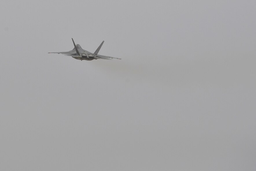 An F-22 Raptor takes off from the runway during a combat sortie at an undisclosed location in Southwest Asia July 9, 2015. The F-22 is a fifth-generation aircraft and is designed to engage in air-to-air and air-to-ground missions. (U.S. Air Force photo/Tech. Sgt. Christopher Boitz)