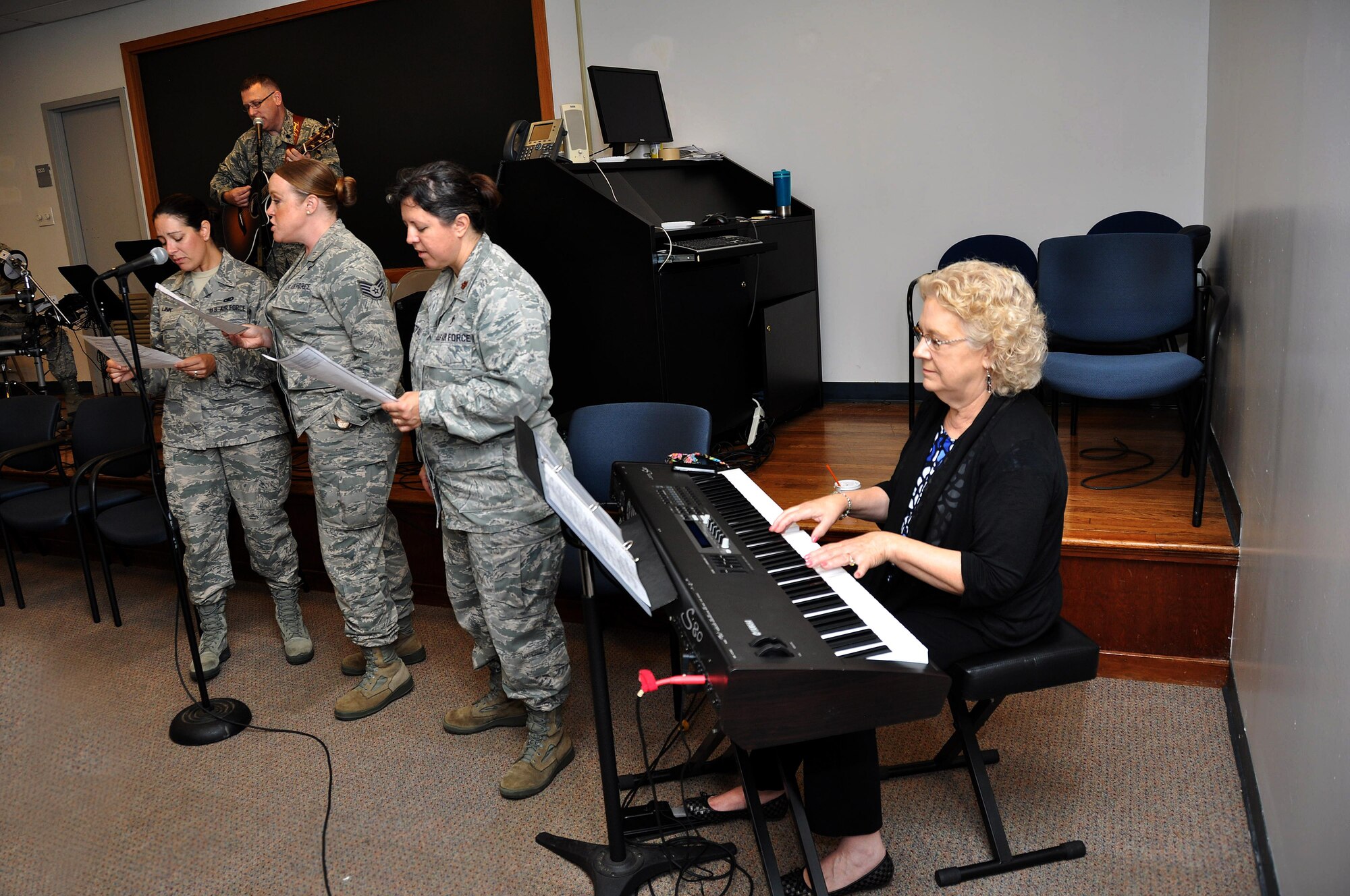 The 94th Airlift Wing chapel band performs hymns during the unit training assembly chapel service July 12, 2015, at Dobbins Air Reserve Base, Ga. The chapel leads monthly traditional Protestant services and visits regularly with Airmen around the base. (U.S. Air Force photo/ Senior Airman Daniel Phelps)