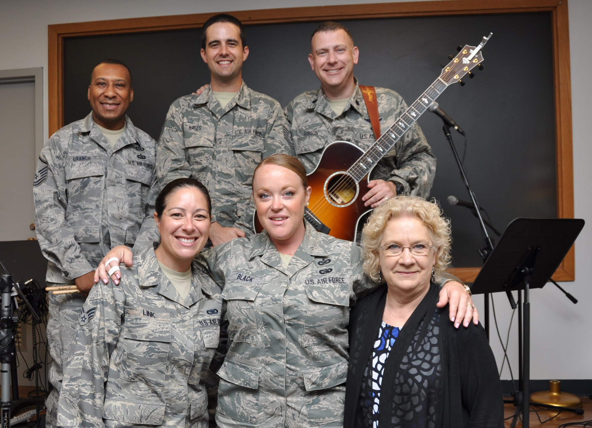 The 94th Airlift Wing chapel band poses for a photo after the chapel service July 12, 2015, at Dobbins Air Reserve Base, Ga. The chapel leads monthly traditional Protestant services and visits regularly with Airmen around the base. (U.S. Air Force photo/ Senior Airman Daniel Phelps)