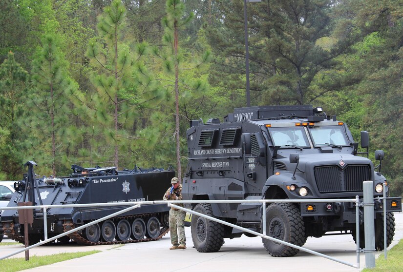 The 81st Regional Support Command participated in a mass casualty exercise on Fort Jackson, S.C., April 7, 2015 which involved the Fort Jackson and local community.  Richland County Sheriff’s Department Special Response Team (SRT) arrived to the 81st RSC to clear the building during the mass causality exercise.   The SRT involves two seven-person teams.  A member of the Medic Team accompanies each entry team in high-risk operations and they’ve  been trained to address barricaded suspects, hostage scenarios, high risk warrants, engage in active counter measures, crowd control, and hostile environmental situations.