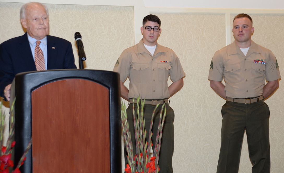 Two Marines from Marine Corps Logistics Base Albany receive recognition for their service to the community and to the Marine Corps during the annual Military Appreciation Rise and Shine Breakfast at the Hilton Garden Inn in downtown Albany, Georgia, July 15.  Lance Cpl. Ethan Kortie, administrative specialist, received the award for Marine of the Year, (center) and Sgt. Steven McGahee, postal noncommissioned officer, Adjutant’s Office, MCLB Albany, received recognition as Noncommissioned Officer of the Year.  
