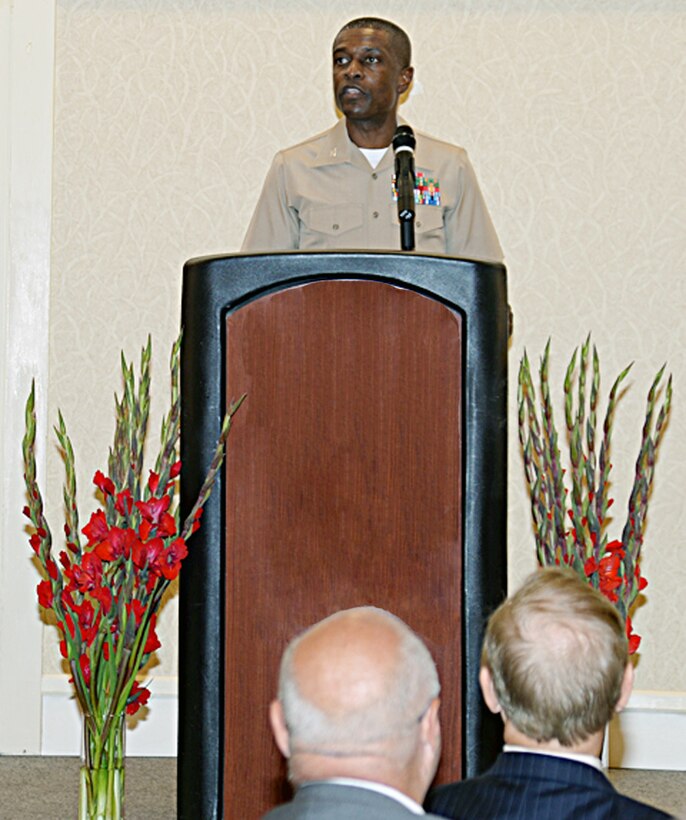 Col. James Carroll III, commanding officer, Marine Corps Logistics Base Albany, addresses community and military members during the annual Military Appreciation Rise and Shine Breakfast at the Hilton Garden Inn in downtown Albany, Georgia, July 15. This event was organized by the Albany Area Chamber of Commerce’s Military Affairs Committee to show appreciation for those who serve and have served in the armed forces.  