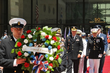 Senior leaders from each branch of the Armed Forces present an Armed Forces wreath during a wreath laying ceremony in Chicago May 23. The wreath laying ceremony was held at the Richard J. Daley Plaza in Chicago during the city’s Memorial Day commemoration there. (U.S. Army photo by Sgt. Aaron Berogan)