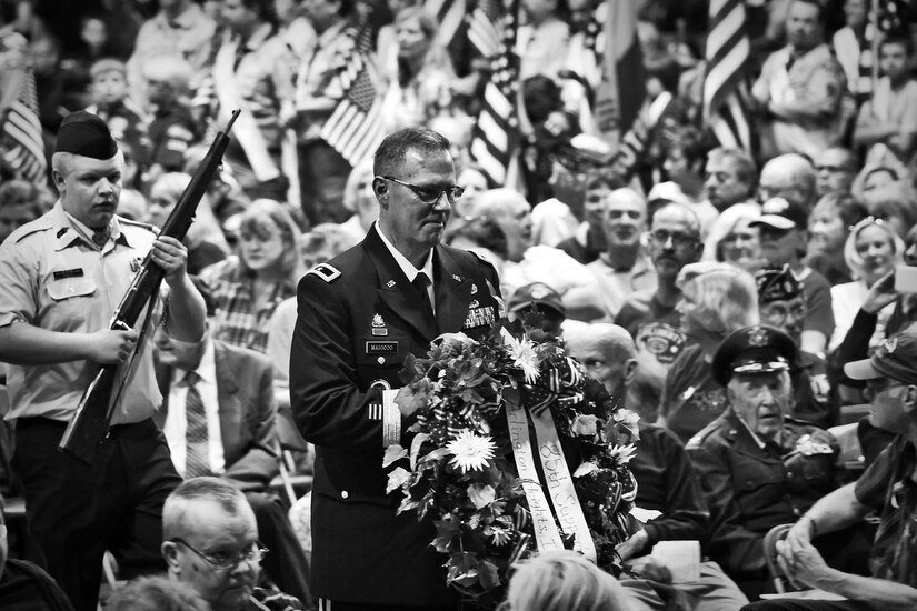 Brig. Gen. Frederick R. Maiocco Jr., commanding general of the 85th Support Command, presents a wreath during a Memorial Day commemoration held in Arlington Heights, Ill., May 25. Maiocco joined a variety of veterans, local police and fire officials as well as local and federal dignitaries in presenting wreaths there. (U.S. Army photo by Sgt. 1st Class Anthony L. Taylor/Released)