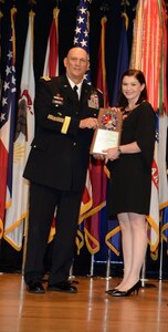 Chief of Staff of the Army, Gen. Raymond T. Odierno, presents Wendy Rich, a tools and parts attendant at Army Maintenance Support Activity 38, with the Army’s supply excellence award at the 11th Annual Chief of Staff of the Army’s Combined Logistics Excellence Awards ceremony, hosted at the Pentagon, Arlington, Virginia, June 10.

AMSA 38, which is based in Wichita, Kansas, and falls under the 88th Regional Support Command, was one of 15 logistics units recognized for superior performance in supply operations, after being judged by evaluators from the U.S. Army Transportation, Ordnance, and Quartermaster Centers.