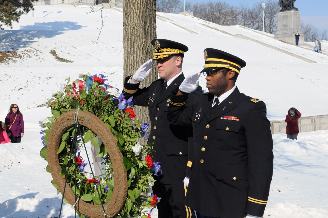 Brig. Gen. R.A. Bassford, deputy commanding general of the 88th RSC, and Chaplain (Capt.) Everett Caldwell of the 256th Combat Support Hospital, render honors to William McKinley during a ceremony at his Presidential Library and Museum in Canton, Ohio, Jan. 31, 2015.