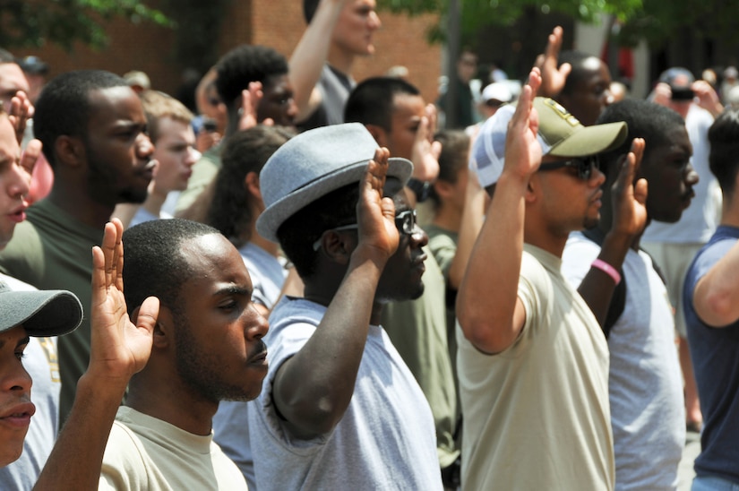 Three-dozen Army recruits take the Oath of Enlistment outside Philadelphia’s Independence Hall June 14 to celebrate Flag Day and the Army’s 240th birthday during the 2015 Stripes and Stars Festival. The festival was hosted by the William Penn Chapter of the Association of the U.S. Army and the Philadelphia Flag Day Association. (U.S. Army photo by Maj. Peter Lupo, 99th Regional Support Command)