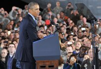 U.S. President Barack Obama speaks to an audience of 3,000 service members, military families, civic leaders and elected officials Dec. 15 inside a U.S. Marine hangar on Joint Base McGuire-Dix-Lakehurst, N.J. The purpose of the president’s visit to JB MDL was to thank troops for their service. Also speaking at the event were Maj. Gen. Margaret W. Boor, commanding general of the Army Reserve’s 99th Regional Support Command, and Maj. Gen. Rick Martin, commanding general of the U.S. Air Force Expeditionary Center.