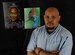 Kevin Lewis, an 86th Force Support Squadron program coordinator, stands by some of his artwork June 29, 2015, at Ramstein Air Base, Germany. One of Lewis’ portraits of the late hip-hop producer J Dilla will be displayed in a memorial exhibit at the Smithsonian Institution in Washington, D.C., on July 17, 2015. (U.S. Air Force photo/Airman 1st Class Larissa Greatwood)