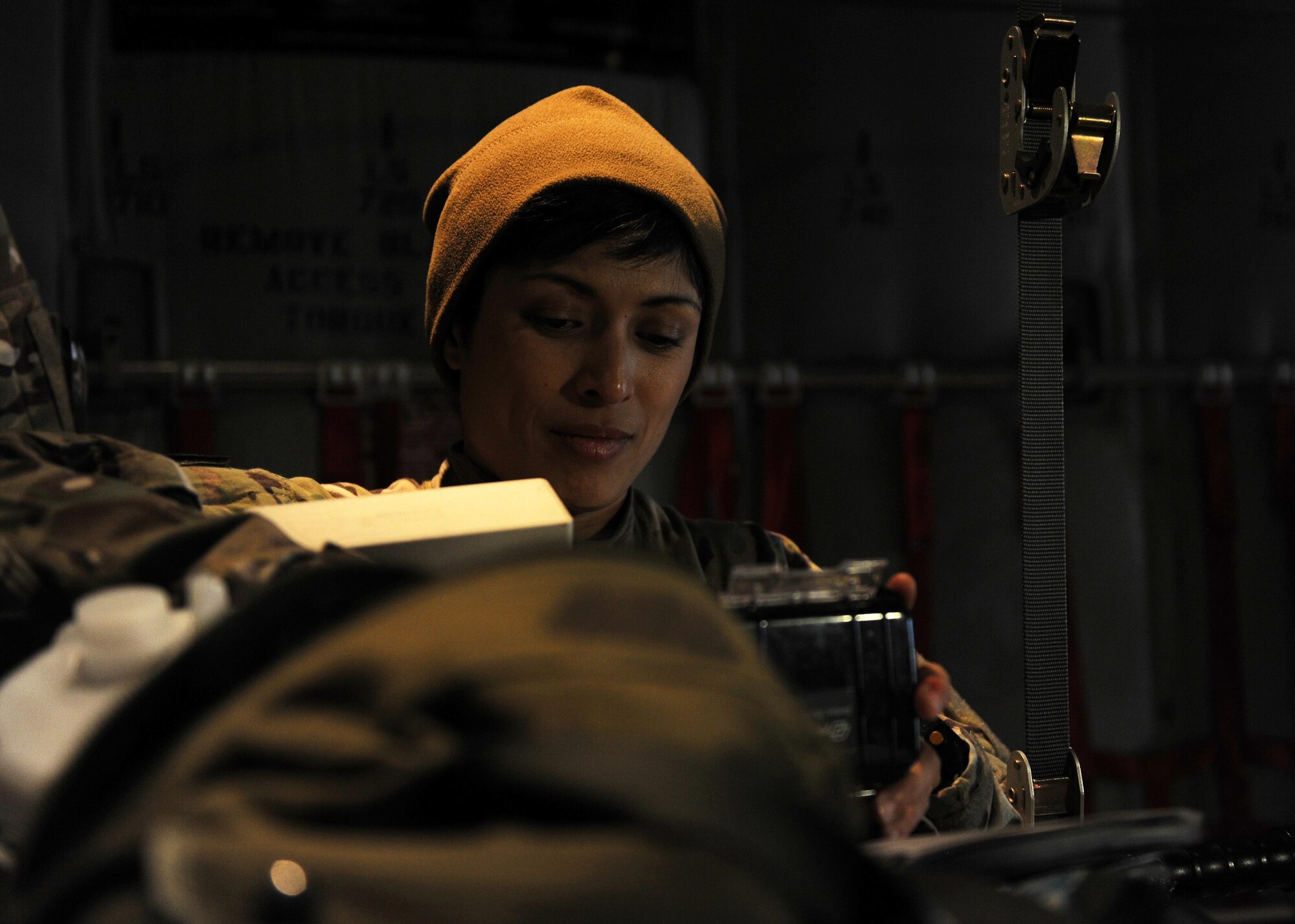 U.S. Air Force Capt. Maria Vazquez, 455th Expeditionary Aeromedical Evacuation Squadron flight nurse, performs functions checks on medical equipment in preparation for an AE mission April 19, 2015 at Bagram Airfield, Afghanistan. 455 EAES Airmen are charged with the responsibility of evacuating the sick and wounded from Central Command to higher echelons of medical care. (U.S. Air Force photo by Staff Sgt. Whitney Amstutz/released)
