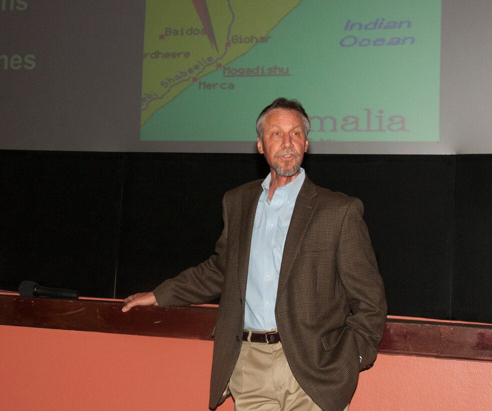 Retired Master Sgt. Tim Wilkinson, Joint Special Operations Command Personnel Recovery Branch chief and former pararescueman, speaks to an audience of F.E. Warren Air Force Base, Wyo., Airmen in the base theater July 2, 2015. Wilkinson took part in the Battle of Mogadishu in 1993 and discussed lessons learned from the battle. (U.S. Air Force photo by Senio¬¬r Airman Jason Wiese)