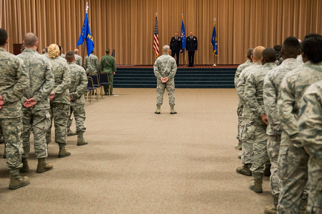 Members of the 307th Bomb Wing attend an Assumption of Command ceremony on July 12, 2015, Barksdale Air Force Base, La. During the ceremony, U.S. Air Force Lt. Col. Leo Kamphaus Jr., assumed command of the 307th Maintenance Group. (U.S. Air Force photo by Master Sgt. Greg Steele/Released)