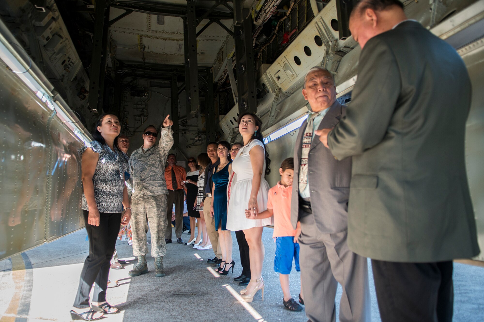 Family members of U.S. Air Force Lt. Col. Leo Kamphaus get a tour of a 307th Bomb Wing B-52H Stratofortress on July 12, 2015, Barksdale Air Force Base, La. The tour preceded an Assumption of Command ceremony where Kamphaus assumed command of the 307th Maintenance Group. (U.S. Air Force photo by Master Sgt. Greg Steele/Released)