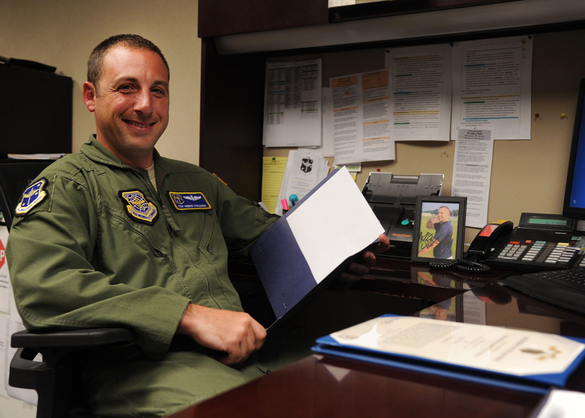 Tech. Sgt. Andrew Strazzinski, a 19th Operations Group awards and decorations manager, processed all awards and decorations from June 2014 to July 2015, which helped the 19th win three Air Mobility Command level awards. Strazzinski, an Arlington, Texas, native, had to standardize criteria and edited products for seven different squadrons before he became a C-130J loadmaster instructor for the 41st Airlift Squadron.(U.S. Air Force photo by Airman 1st Class Mercedes Muro) 