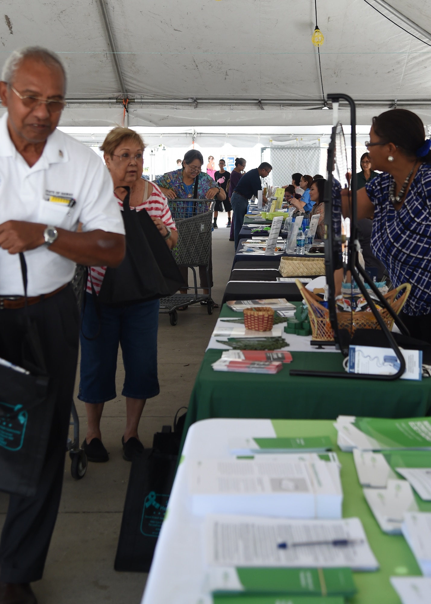 In honor of Military Consumer Protection Day, the Hawaii Department of Commerce and Consumer Affairs hosted a Consumer and Financial Protection Fair at the Navy Exchange Mall, Hawaii, July 15, 2015. Comprised of over two dozen government and nonprofit agencies, the fair had representatives from the Department of the Attorney General, Hawaii Homeownership Center, Internal Revenue Service, and the Military Family Support Center, just to name a few. (U.S. Air Force photo by Tech. Sgt. Aaron Oelrich/Released)