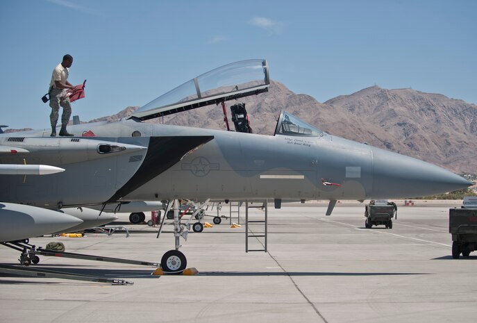 Senior Airman Quenton Richardson, 159th Maintenance Squadron crew chief, Louisiana Air National Guard, inspects an F-15 Eagle during Red Flag 15-3 at Nellis Air Force Base, Nev., July 14, 2015. Crew chiefs are responsible for overseeing the day-to-day maintenance of aircraft, including diagnosing malfunctions and replacing components, and conducting various inspections to ensure the aircraft is functioning properly. (U.S. Air Force photo by Staff Sgt. Siuta B. Ika)