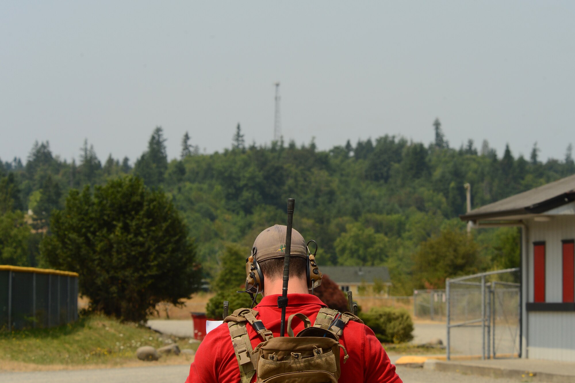 An Airman from the 22nd Special Tactics Squadron conducts close air support
training July 9, 2015, near Joint Base Lewis-McChord, Wash. The 22nd STS
Airmen conduct the training in the communities around JBLM to avoid airspace
issues over JBLM, simulate small villages and save money by not traveling
for training. (U.S. Air Force photo\ Staff Sgt. Tim Chacon)
