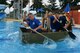 First sergeants from Team Incirlik paddle across the base pool during the 2nd Annual Cardboard Cup Race July 10, 2015, at Incirlik Air Base, Turkey. This is the second consecutive year the event has been held at Incirlik. (U.S. Air Force photo by Senior Airman Michael Battles/Released)