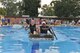 Airman 1st Class Jessica Gearheart, 39th Logistics Readiness Squadron supply journeyman, and Airman 1st Class Ladarius Crenshaw, 39th  Communications Squadron commander’s support staff journeyman, race across the base pool during the 2nd Annual Cardboard Cup Race July 10, 2015, at Incirlik Air Base, Turkey. Based on bracket elimination, awards were given out for the fastest two and four person boat, as well as, the Titanic award, for the boat that sank the fastest. (U.S. Air Force photo by Senior Airman Michael Battles/Released)