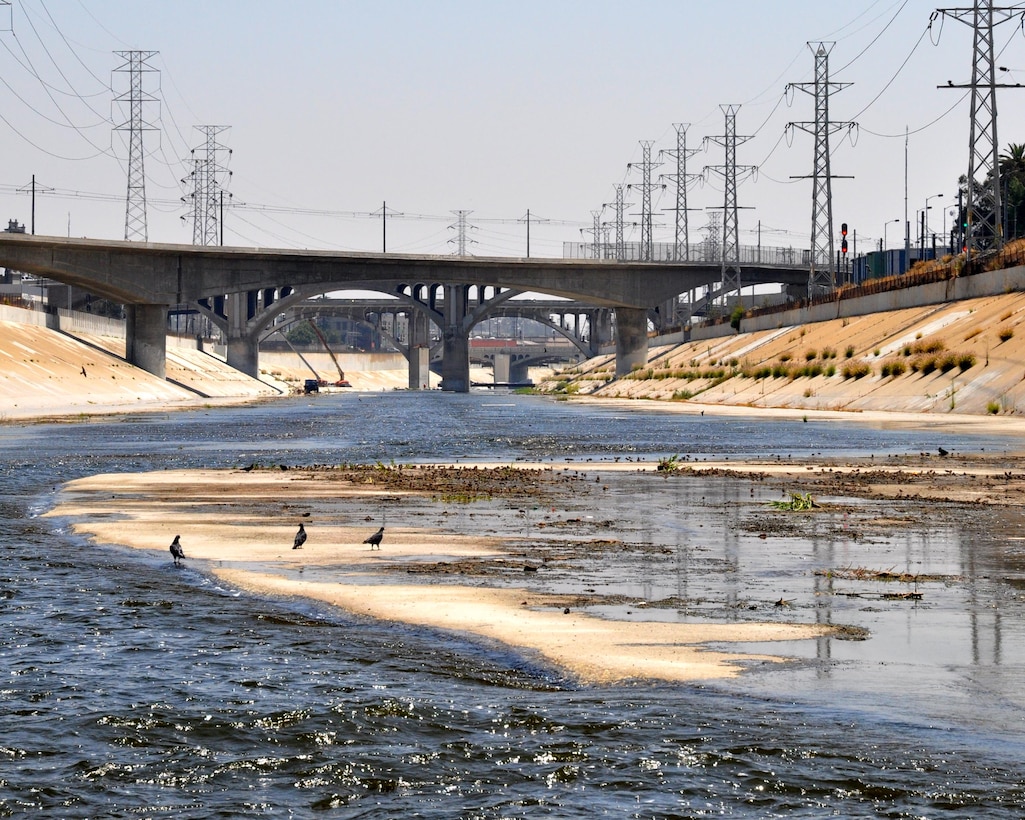 Water flows through the concrete channel of the Los Angeles River on its journey towards the Pacific Ocean Aug. 12, 2013.