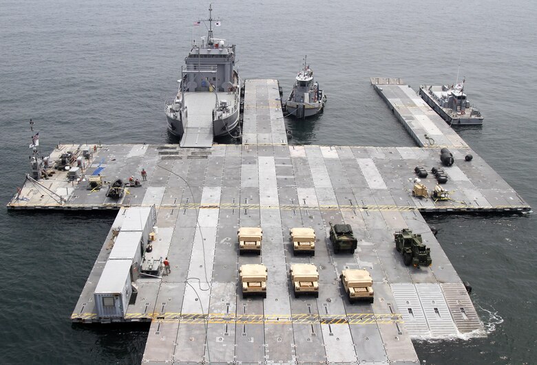 A Roll-on Roll-off Discharge Facility is attached to the USNS 2nd Lt. John P. Bobo (T-AK 3008) during the Combined Joint Logistics Over-the-Shore exercise off the shore of Anmyeon Beach, Republic of Korea, July 1, 2015. CJLOTS 2015 is an exercise designed to train U.S. and ROK services members to accomplish vital logistical measures in a strategic area while strengthening communication and cooperation in the U.S.-ROK Alliance. (U.S. Army photo by Staff Sgt. Chris Perkey)