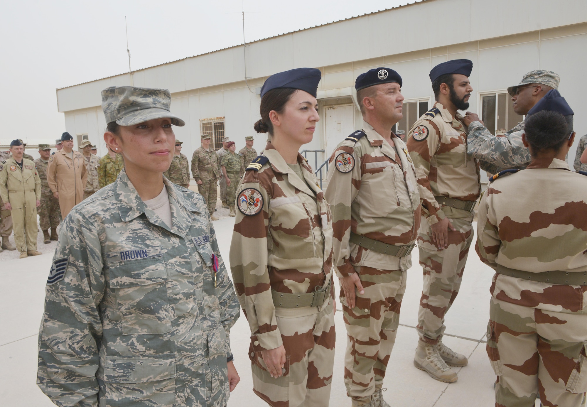 Military members from the Combined Air Operations Center received a French National Defense Medal during the Bastille Day ceremony July 14, 2015 at Al Udeid Air Base, Qatar. The French celebrate July 14th as Bastille Day to commemorate the storming of Bastille at the beginning of the French revolution in 1789. (U.S. Air Force photo/Staff Sgt. Alexandre Montes)