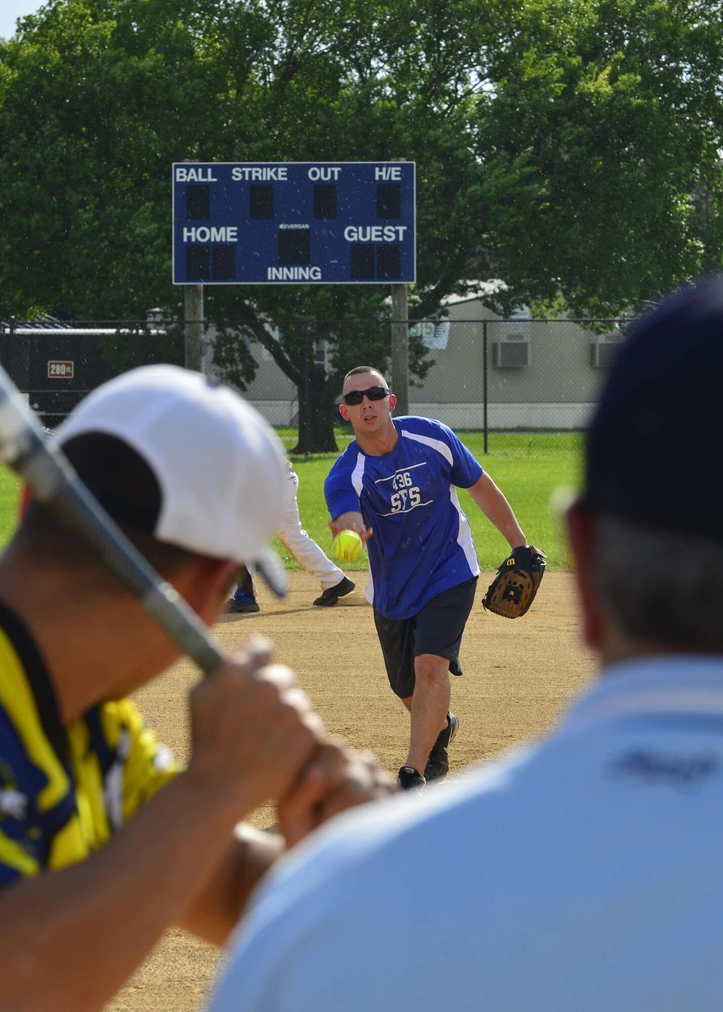 The 436th Aircraft Maintenance Squadron defeated the 436th Security Force Squadron 18-12 in intramural softball July 6, 2015, at Dover Air Force Base, Del. (U.S. Air Force photo/Airman 1st Class William Johnson)