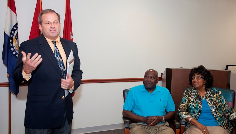 Dr. Randy Hathaway, Little Rock District’s Deputy Engineer, recounts more than 20 years of dedicated to the Corps during Henry Hollins’ retirement ceremony in Little Rock this spring.  Hollins, seated next to his wife Eva Hollins, coupled more than 20 years of civil service with 30-plus years of active duty in the U.S. Air Force for a total of 51 years of total federal service.