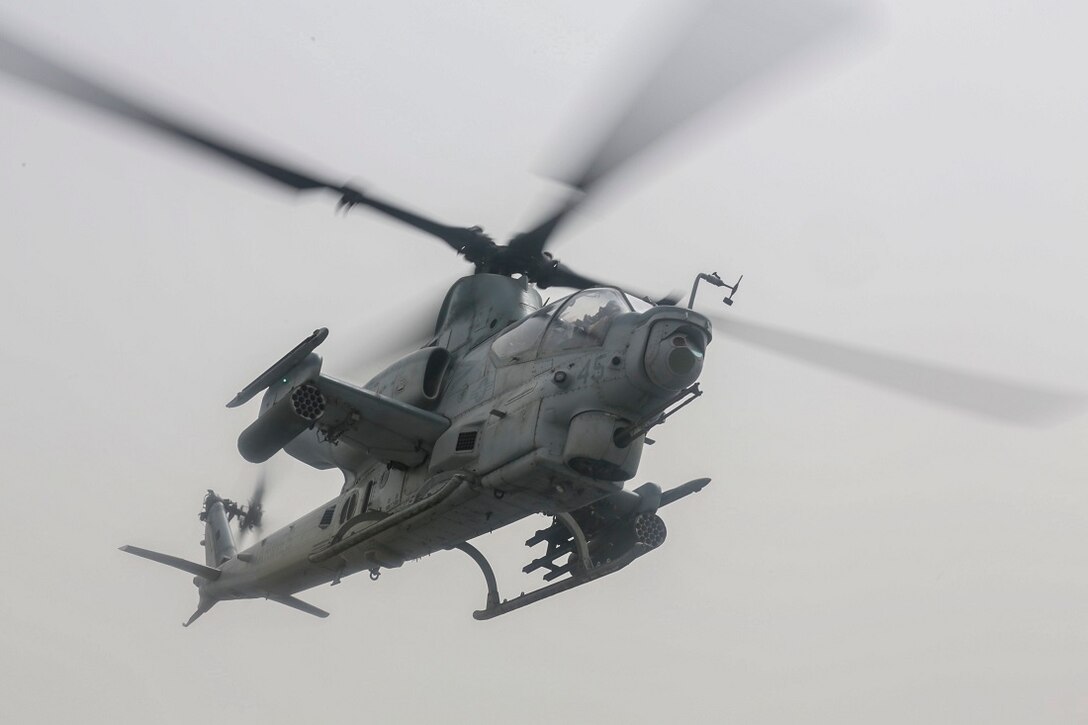 150714-M-GC438-207 ARABIAN SEA (July 14, 2015) An AH-1Z Viper with the “Greyhawks” of Marine Medium Tiltrotor Squadron 161 (Reinforced), 15th Marine Expeditionary Unit, takes off from the amphibious transport dock ship USS Anchorage (LPD 23). The “Greyhawks” are the aviation combat element of the 15th MEU, and embarked aboard the ships of the Essex Amphibious Ready Group, are deployed in support of maritime security operations and theater security cooperation efforts in the U.S. 5th Fleet area of operations. (U.S. Marine Corps photo by Sgt. Jamean Berry/ Released)