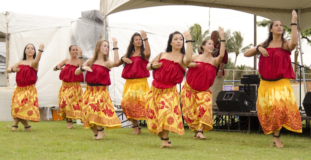 Members of the Kaanohiwaianuenue Hula Studio perform during the Relay for Life of Windward Oahu event at Kailua High School, July 11, 2015. Many volunteers from Marine Corps Base Hawaii joined the Windward Oahu community at the fundraiser event for cancer. The American Cancer Society’s Relay for Life events, occur in communities nationwide. (U.S. Marine Corps photo by Kristen Wong/Released)