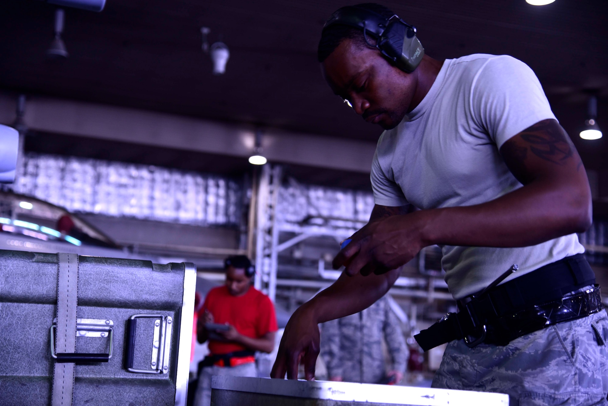 U.S. Air Force Senior Airman Keith Enty, 35th Aircraft Maintenance Squadron weapons load crew member, conducts an inspection of supplies during a load crew competition at Misawa Air Base, Japan, July 17, 2015. This competition is held once a quarter, in addition to a final round, to determine the load crew team of the year. (U.S. Air Force photo by Airman 1st Class Jordyn Fetter/Released) 
