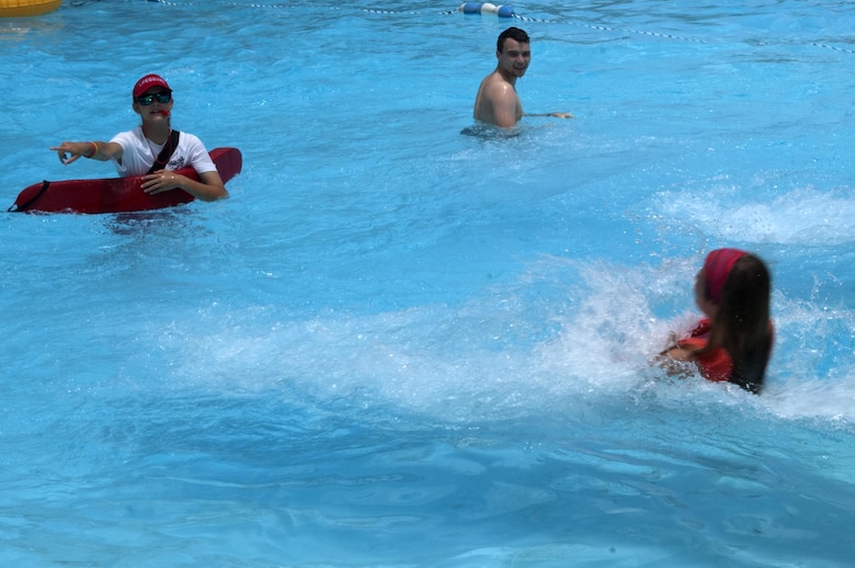 A life guard at Nashville Shores Lakeside Resort ensures a swimmer safely exits from a ride July 10, 2015.  The U.S. Army Corps of Engineers Nashville District’s park rangers at J. Percy Priest Lake are partnering with Nashville Shores Lakeside Resort this summer to promote water safety.  The Corps is setting up a booth every Friday from noon to 2 p.m. to pass out water safety goodies and to talk with families about wearing life jackets when recreating at the park and lake.