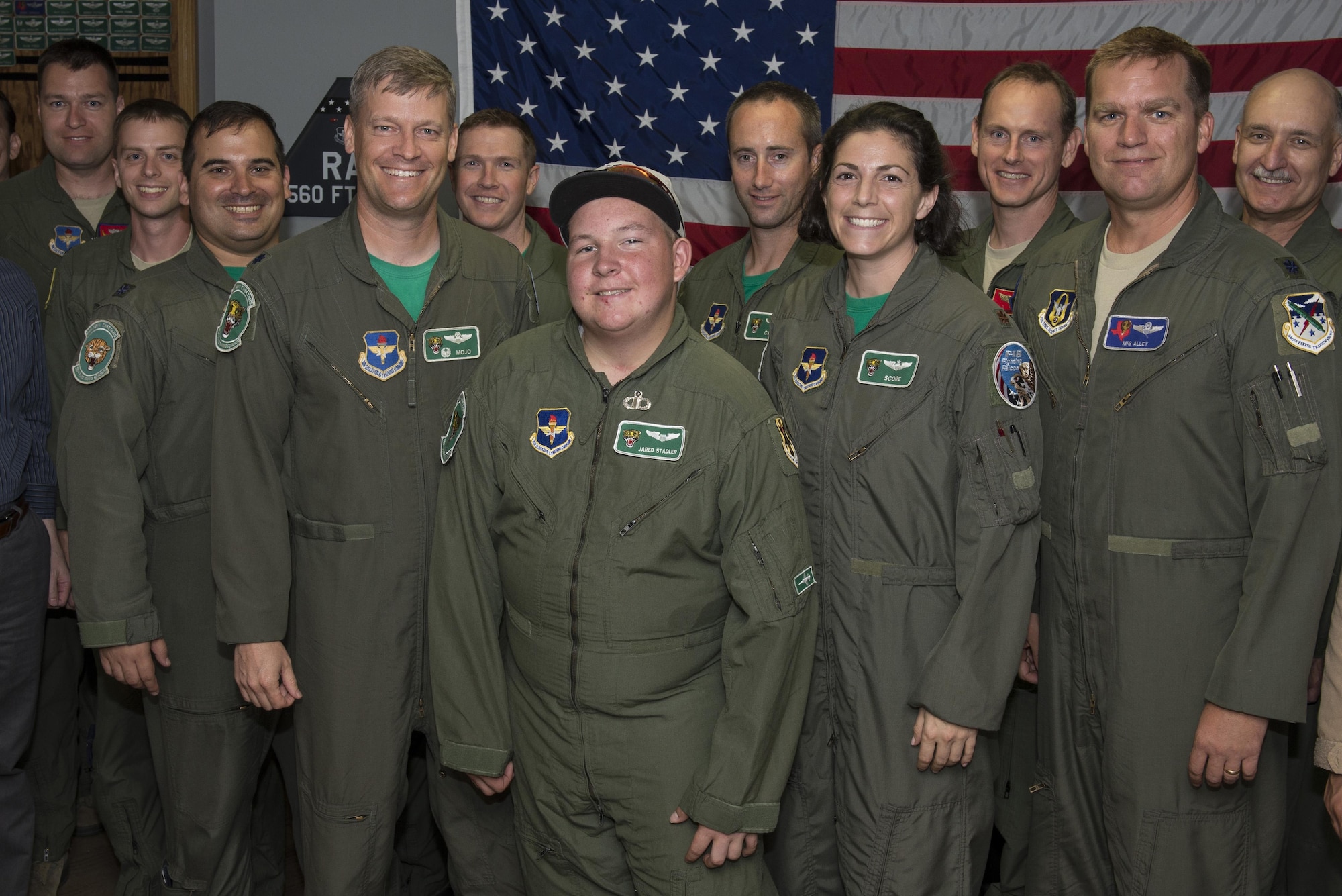 Jared Stadler,560th Flying Training Squadron pilot for a day, stands with members of the 560th FTS July 17, 2015, at Joint Base San Antonio-Randolph. The "Pilot for a Day" program helps give children with chronic illnesses a break from the challenges they face each day by showing them what it is like to be an Air Force pilot.(U.S. Air Force photo by Airman 1st Class Stormy Archer/Released)