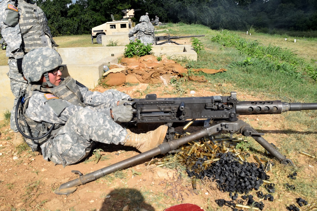Members of the Texas Army National Guard conduct weapons training on Camp Swift, Texas, July 14, 2015. 