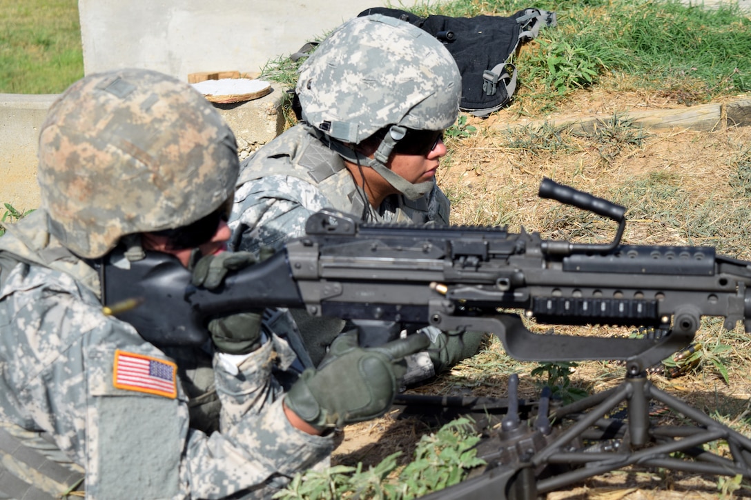 Members of the Texas Army National Guard conduct weapons training on Camp Swift, Texas, July 14, 2015. 