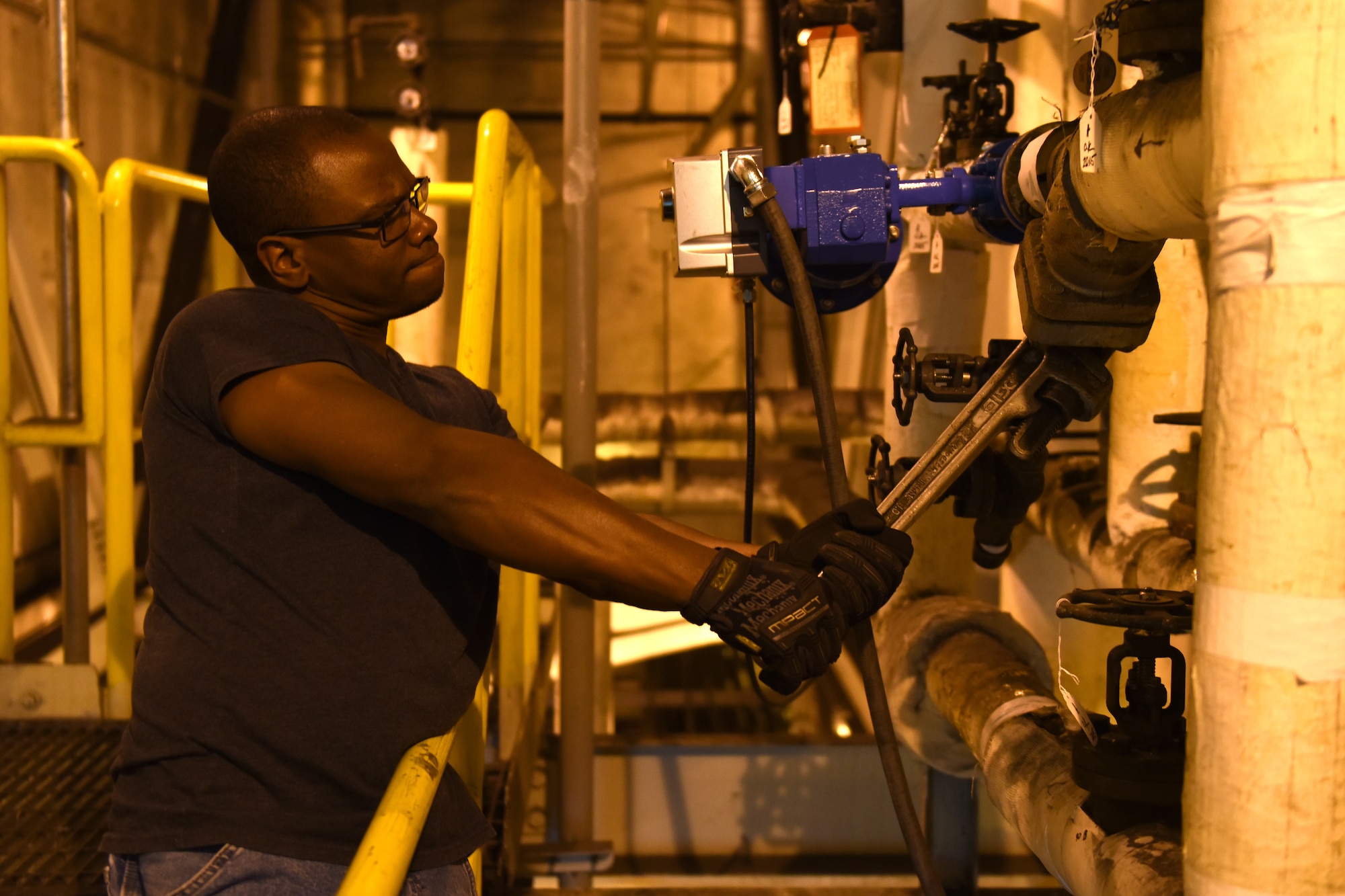 Colby Holloman, 341st Civil Engineer Squadron utilities systems operator, repaires piping on a high-temperature water strainer at the heat plant July 16, 2015, at Malmstrom Air Force Base, Mont. Heat plant operations provides essential heating to 70 infrastructure buildings on base. (U.S. Air Force photo/Chris Willis)