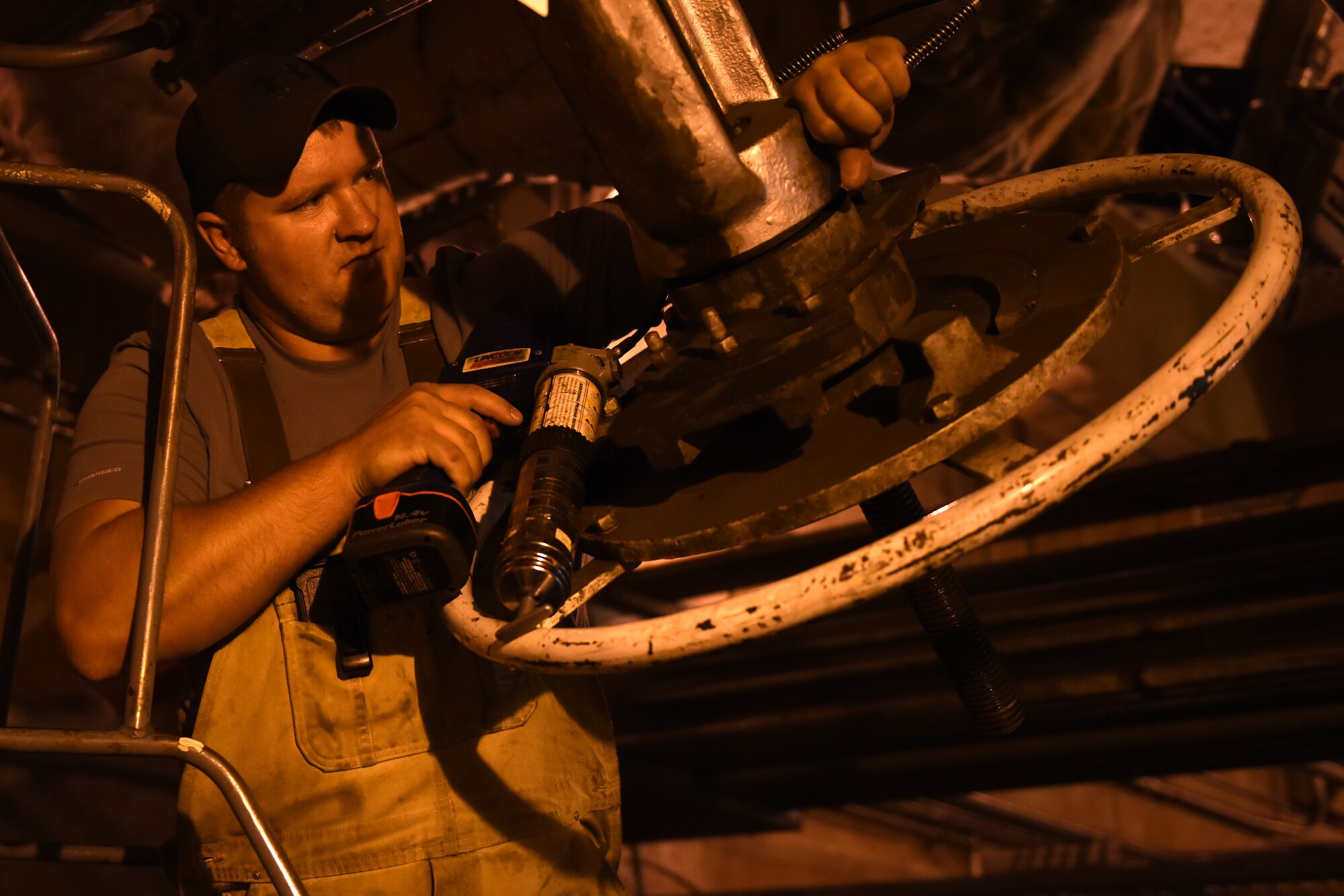 John Makoski, 341st Civil Engineer Squadron utilities systems repairer, does preventive maintenance on a high-temperature water valve at the heat plant July 16, 2015, at Malmstrom Air Force Base, Mont. The heat plant is a dual fuel plant with natural gas as the primary fuel and stoker coal as the secondary fuel. (U.S. Air Force photo/Chris Willis)