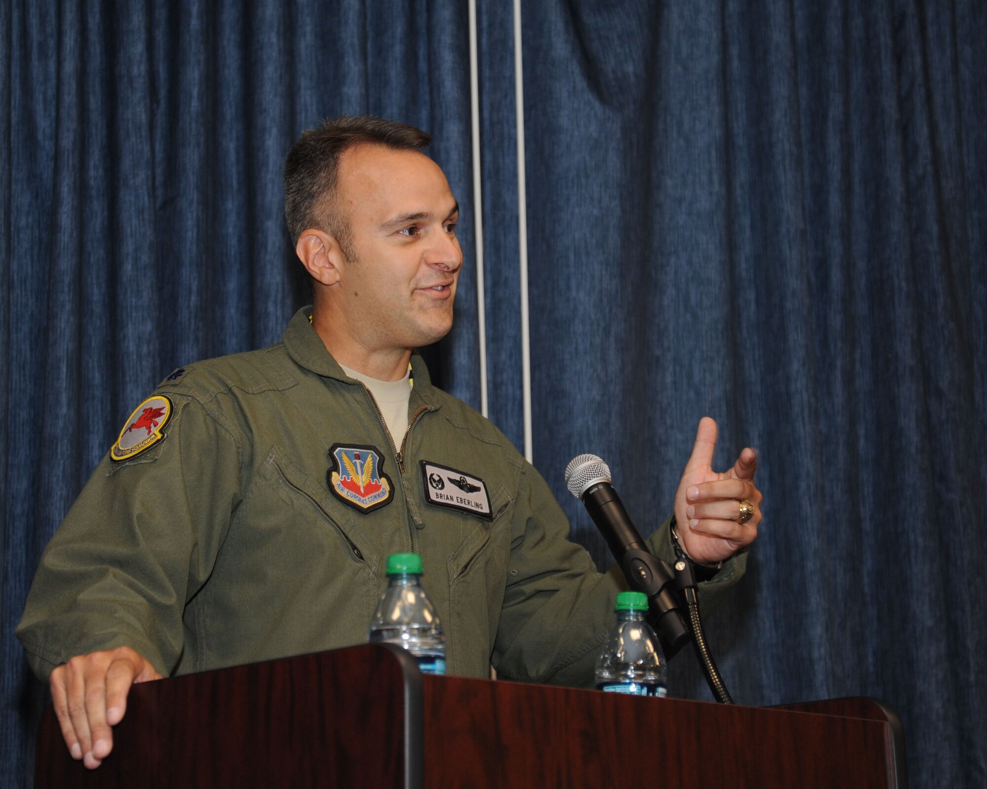 Lt. Col. Brian Eberling, former 509th Weapons Squadron commander, thanks his Airmen, friends, coworkers and family for their dedication to the mission and teamwork during the 509th WPS change of command ceremony July 17, 2015, at Fairchild Air Force Base, Wash. Eberling has deployed in support of Operations Allied Force and Enduring Freedom, and is a command pilot with more than 3,700 flight hours. (U.S. Air Force photo/Senior Airman Sam Fogleman)