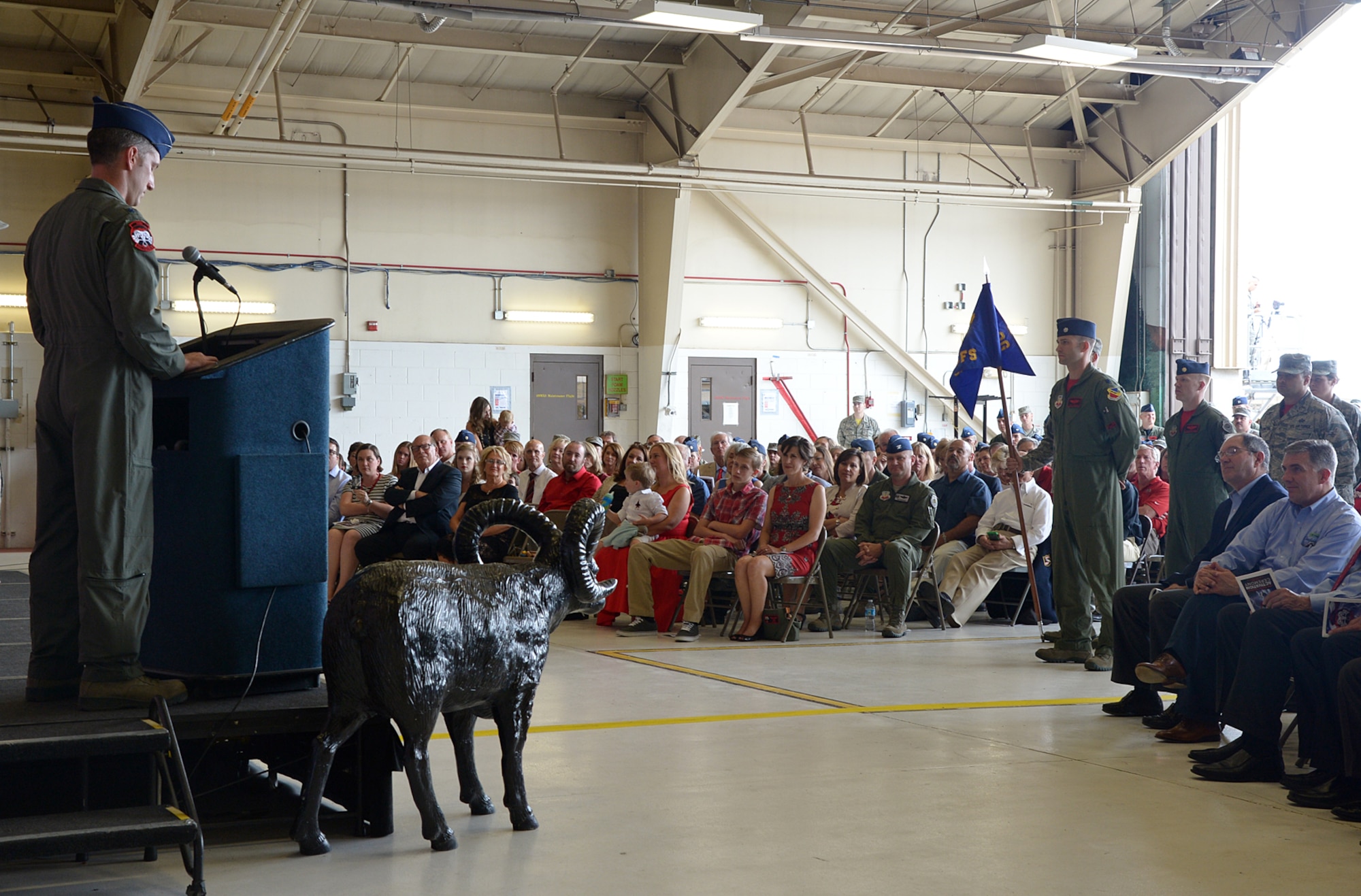 Lt. Col. George R. Watkins addresses the audience and squadron members during the 34th Fighter Squadron activation ceremony July 17 at Hill Air Force Base, Utah. The 34th will be the first combat squadron to fly the Air Force’s newest fighter aircraft, the F-35A. The squadron has an extremely rich history. After many contributions in major U.S. conflicts, the 34th was relocated to Hill AFB on Dec. 8, 1975, where they became the first fighter squadron to receive the F-16 fighter aircraft. The squadron’s first F-35A will arrive in September.  (U.S. Air Force photo by Alex R. Lloyd/Released)