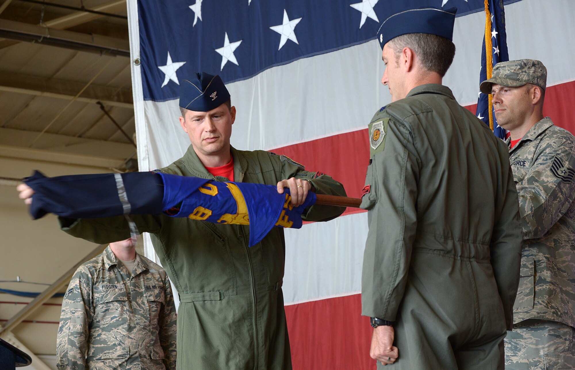 Col. David B. Lyons unfurls the 34th Fighter Squadron’s guidon during its activation ceremony July 17 at Hill Air Force Base, Utah. The 34th will be the first combat squadron to fly the Air Force’s newest fighter aircraft, the F-35A. The F-35A is the U.S. Air Force's latest fifth-generation fighter. With its aerodynamic performance and advanced integrated avionics, it will provide next-generation stealth, enhanced situational awareness, and reduced vulnerability for the United States and allied nations. The 34th’s first F-35A will arrive in September. (U.S. Air Force photo by Alex R. Lloyd/Released)