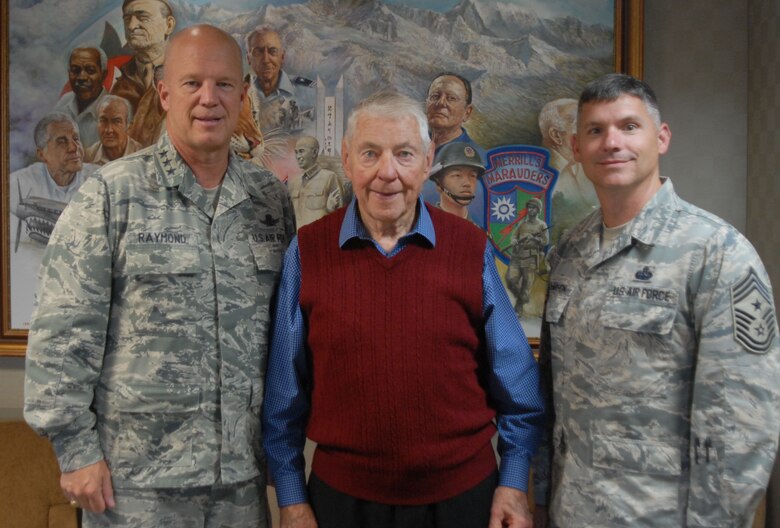 Retired Chief Master Sgt. of the Air Force Robert Gaylor (center), poses for a photo with Lt. Gen. Jay Raymond, commander, 14th Air Force (Air Forces Strategic) and Joint Functional Component Command for Space (left) and Chief Master Sgt. Patrick McMahon, command chief, 14th AF and JFCC Space Command Senior Enlisted Leader, during a visit here, July 16, 2015. Gaylor received a brief base tour of Vandenberg but spent most of his time engaging with Airmen during the many speaking engagements on his visit. (U.S. Air Force photo by Capt. Nicholas Mercurio/Released)