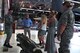 Relatives of U.S. Navy Lt. Seymour Johnson learn about munitions, July 15, 2015, at Seymour Johnson Air Force Base, North Carolina. Senior Airman Richard Hayes, 4th Maintenance Group squadron lead crew member, explained to the family which bombs are loaded onto the F-15E Strike Eagle and what each is used for. (U.S. Air Force photo/ Senior Airman Daniel Blackwell)